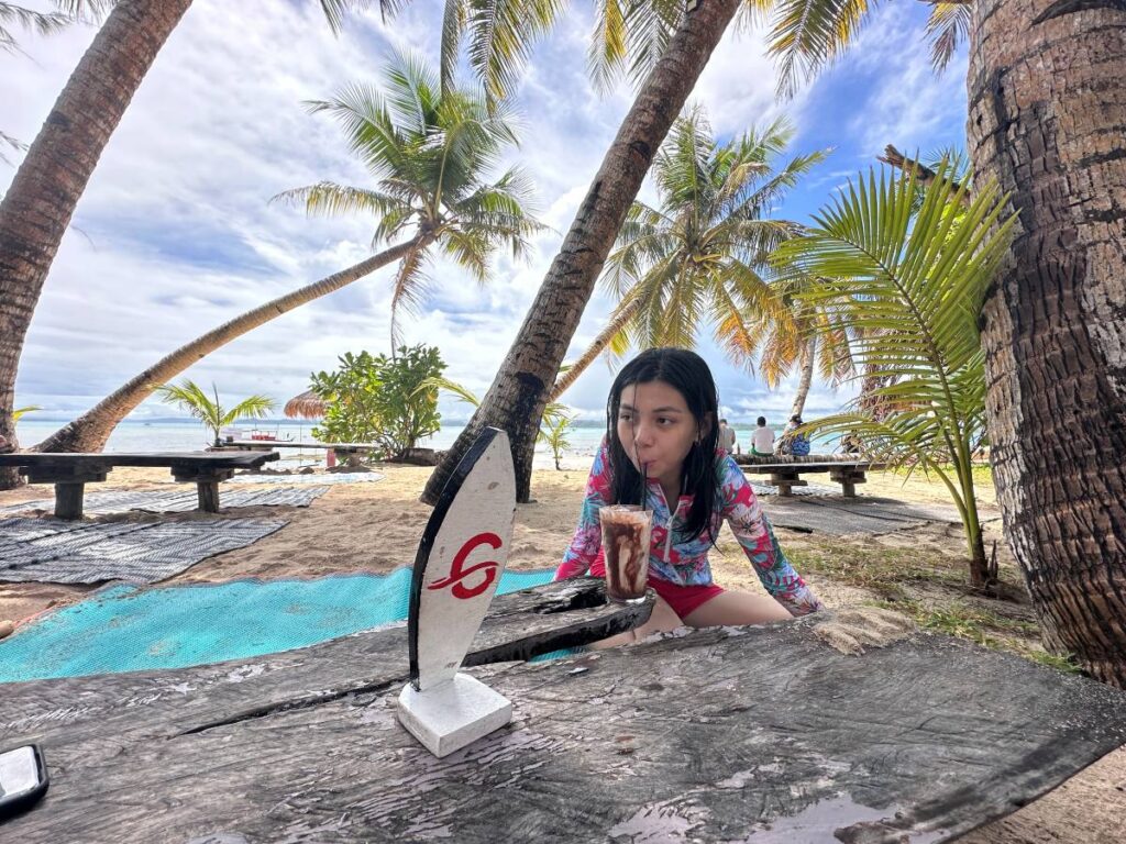 Nyah enjoying her chocolate shake at Guyam Island